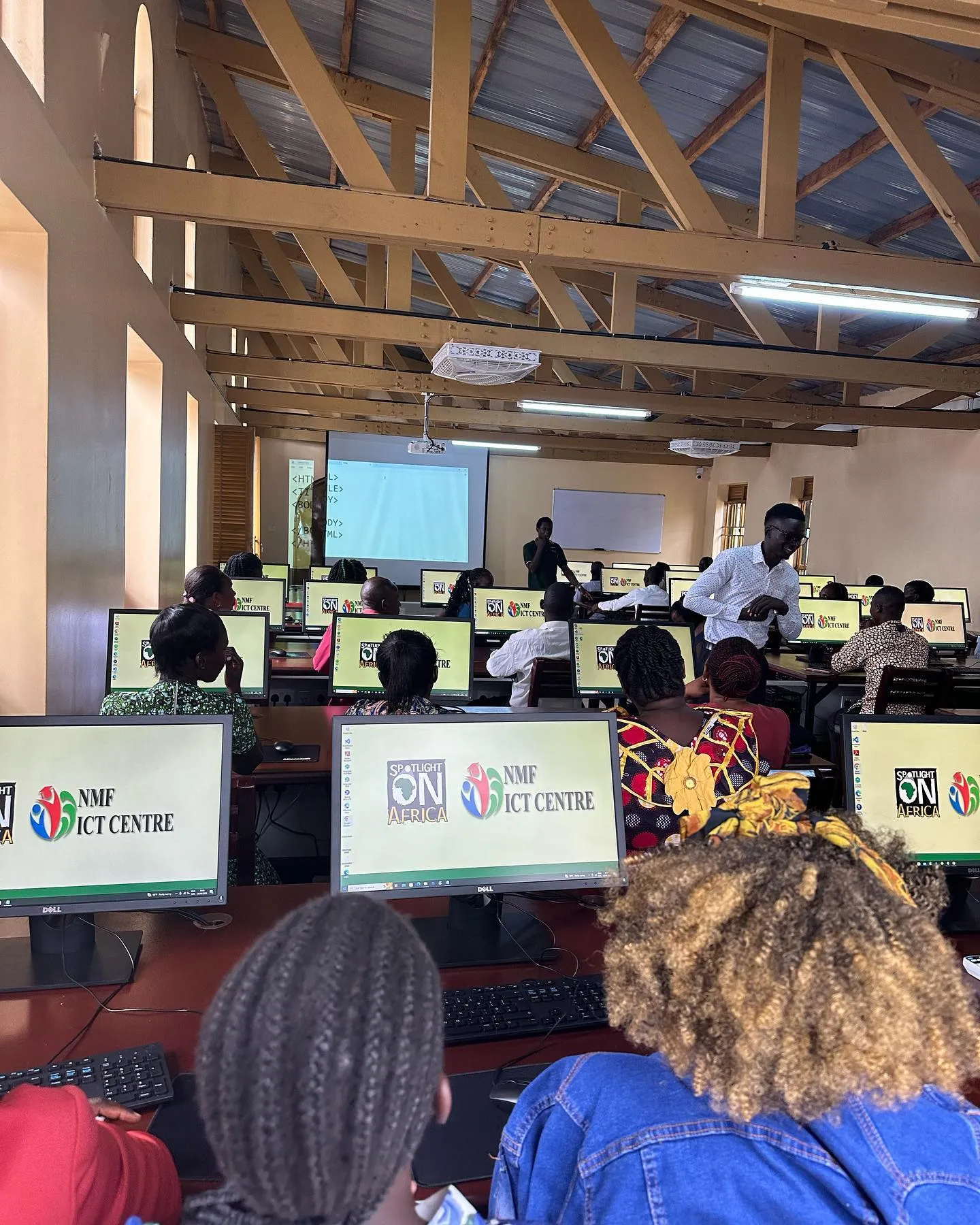 Students at computers in the NMF ICT Centre in Mbale, Uganda